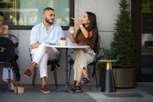 Young couple at a terrace table